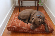 XL Dog Bed Multi Pattern on Rust Mudcloth.